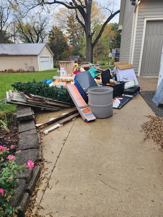 Dumpster being loaded with debris for 3 Yard Dumpster Rental in Charleroi